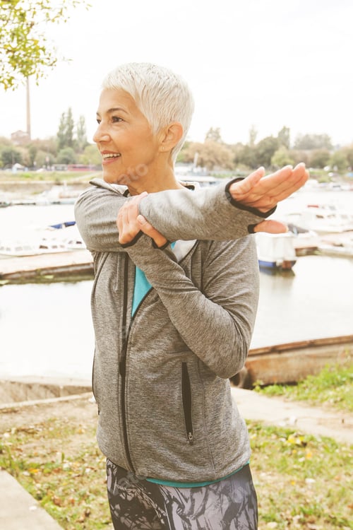 Preview: Active Senior Woman In Sportswear Doing Fitness Exercise, Workout Outdoor.