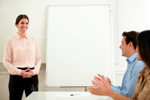Preview: Portrait Of Handsome Man And Beautiful Lady Giving Applause To Businesswoman Who Is Standing In