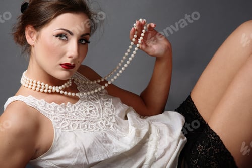 Preview: Beautiful Girl In White Vintage Blouse And Black Lacy Panties Holding Necklace Of Pearl Beads
