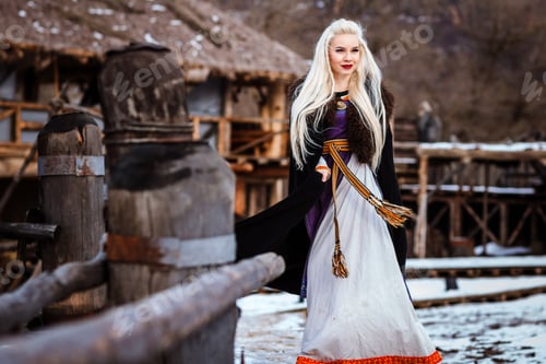 Preview: Beautiful Young Woman Holding A Viking With Blond Hair. Image Of Historical Figure
