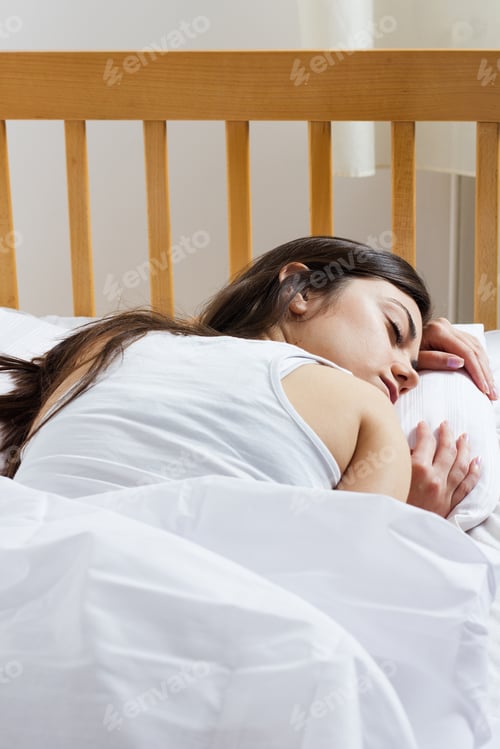 Preview: Beautiful Young Woman Sleeping In The Bed.