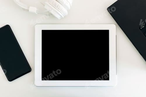 Preview: On A Bright Table Is A Tablet With A Blank Screen