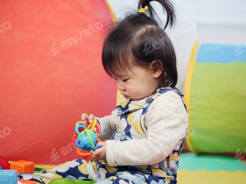 Preview: Baby Girl Play Toy At Home