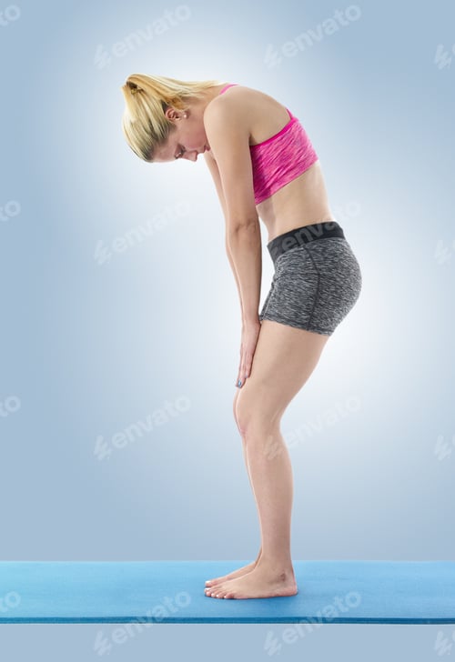 Preview: A Pretty Young Slim Woman Exercising With Yoga
