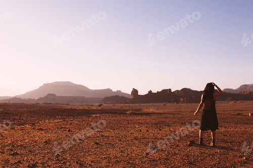 Preview: Beautiful Young Woman In Timna, Desert In Israel. Rocks In Sunset Time. Mystic Concept