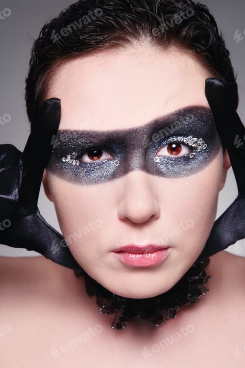Preview: Woman with Dramatic Eye Makeup and Black Gloves