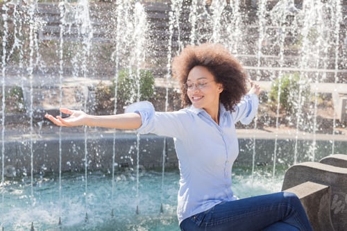 Preview: Outdoor Portrait Of Happy Beautiful Young African Woman With Open Arms, Face Smiling,Afro Hair