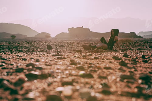 Preview: Beautiful Young Woman In Timna, Desert In Israel. Rocks In Sunset Time. Mystic Concept