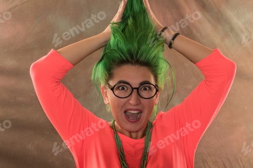 Preview: A Caucasian Girl In A Green Dress And With Green Hair Is Preparing For The Holidays. Suit Of The