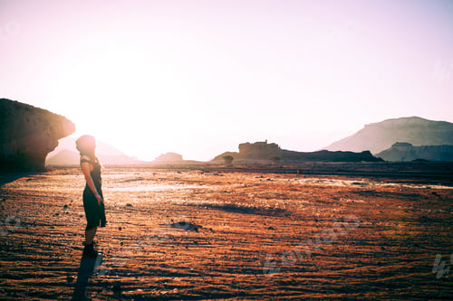Preview: Beautiful Young Woman In Timna, Desert In Israel. Rocks In Sunset Time. Mystic Concept