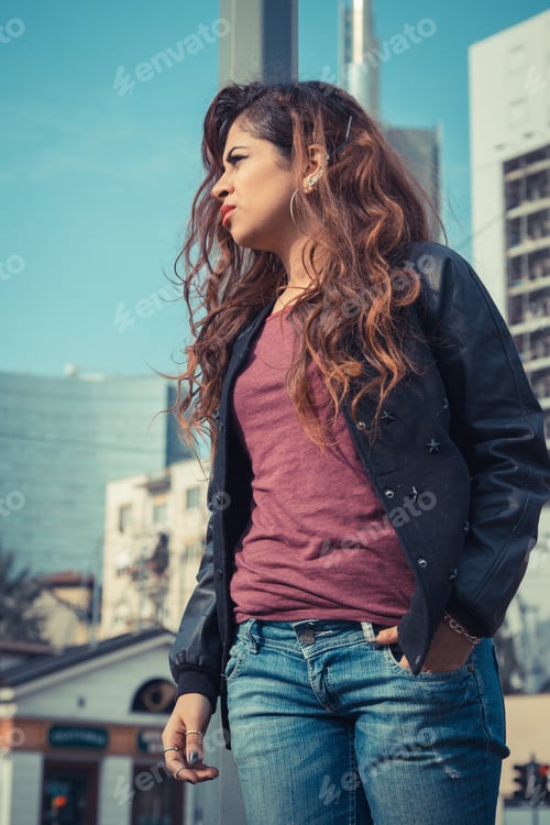 Preview: Stylish Woman Posing in Urban Cityscape