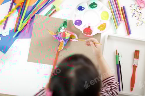 Preview: Young Girl Painting Hand Made Craft At Home