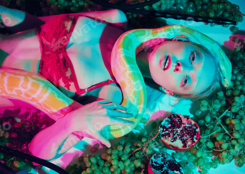 Preview: A Young Blonde Girl In Lingerie Lies With A Snake Surrounded By Grapes And Pomegranates.