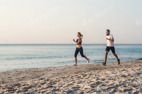 Preview: Running People - Woman And Man Athlete Runners Jogging On Beach. Fit Young Fitness Couple