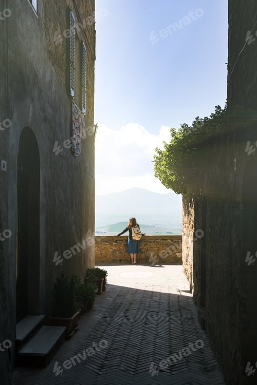 Preview: Pienza - Girl Looking At The Tuscanian Landscape. Tuscany, Italy