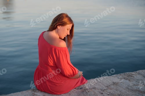 Preview: The Girl In The Red Dress Looks At The Sea