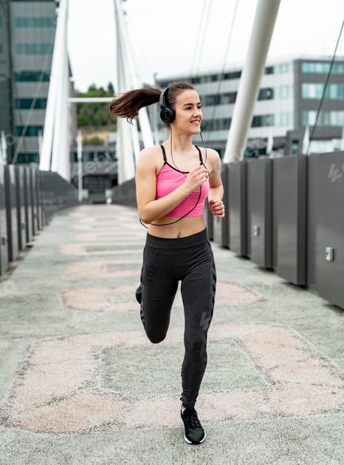 Preview: Sports Woman Jogging Down At Urban Outdoor Trail.