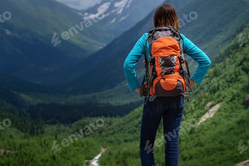 Preview: Backpacker On Top Of A Mountain Enjoying Valley View. Wanderlust Travel Concept, Space For Text