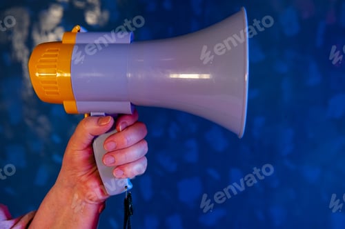 Preview: Beautiful Senior Woman Is Excited, Euphoric, Screaming With Megaphone, Sign Of Revolution And