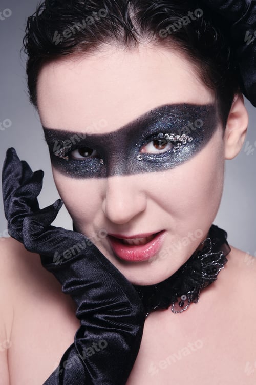Preview: Woman Wearing Dramatic Glitter Makeup and Black Gloves