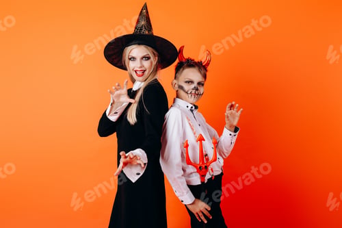 Preview: Mother And Sun In Devil Masquerade Makeup. Halloween Concept