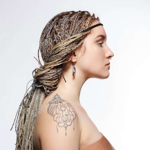Preview: Portrait Of Young Woman With Stylish Hairstyle From Dreadlocks.