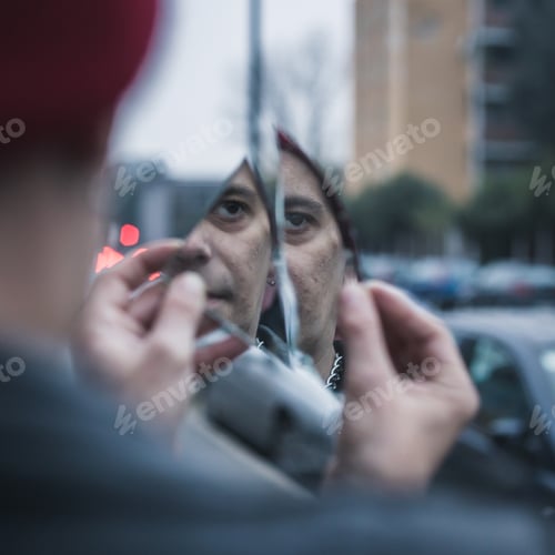 Preview: Punk Guy Looking At Himself In A Shattered Mirror In The City Streets