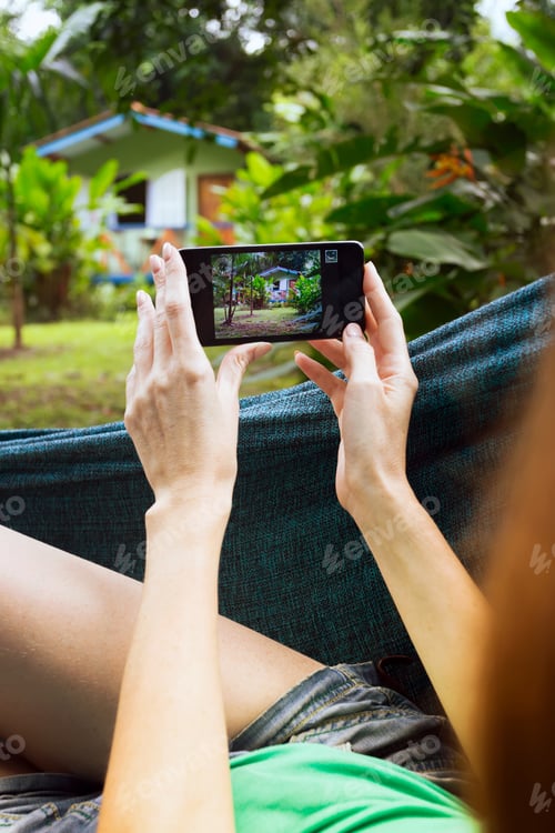 Preview: Girl Lying And Taking A Photo In A Hammock In The Tropical Jungles Of Brazil. Brasil