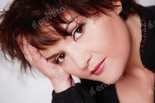 Preview: Portrait Of Attractive Thoughtful Woman With Natural Makeup