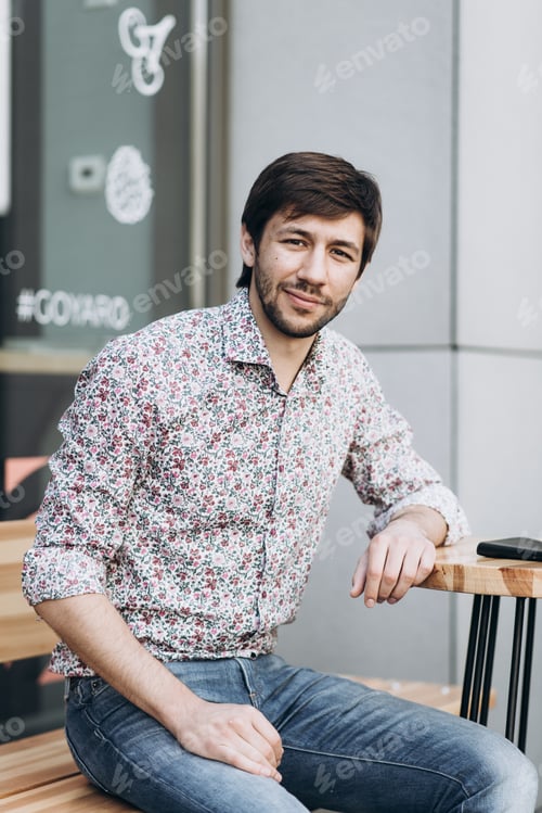 Preview: Fashionable Smiling Man In Urban Setting
