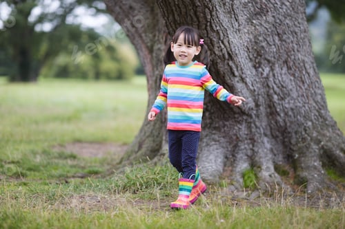 Preview: Young Girl Playing In The Summer Forest Park
