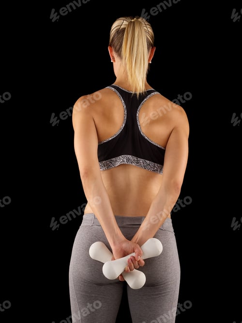 Preview: Perfect Buttocks. Rear View Of Sporty Woman With Perfect Buttocks Holding Dumbbells While Standing