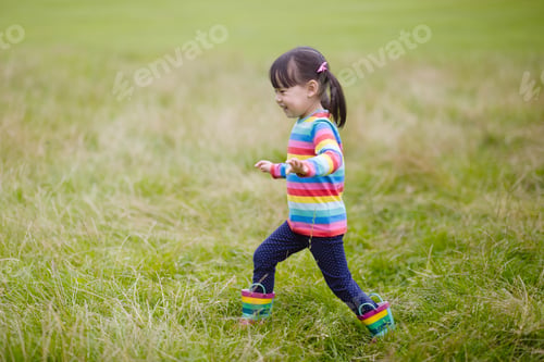 Preview: Young Girl Playing In The Summer Forest Park