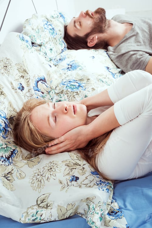 Preview: Young Caucasian Couple In Bed. Male Snoring And Female Can Not Sleep