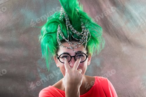 Preview: A Caucasian Girl In A Green Dress And With Green Hair Is Preparing For The Holidays. Suit Of The