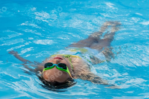 Preview: Funny Young Girl And Boys In Rainbow Glasses For Swimming Play In Blue Water Of Frame Pool