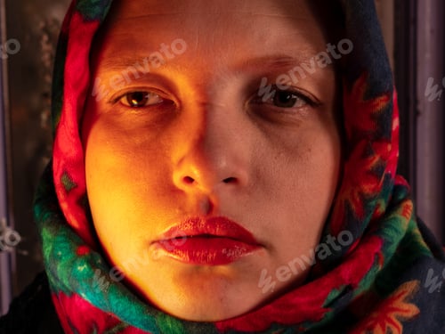 Preview: Beautiful Woman In Flowered Colored Shawl Is Holding Smartphone Of Latest Modification. Early Color
