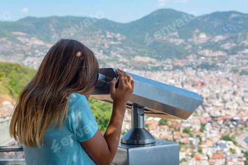 Preview: Girl Looking Through Binocular On The Panorama Of The City
