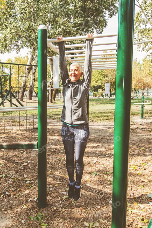 Preview: Fit Senior Woman Stretching At Outdoor Gym, Healthy Lifestyle Old People.