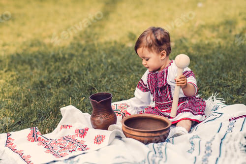 Preview: The Little Girl In The National Costume On A Picnic