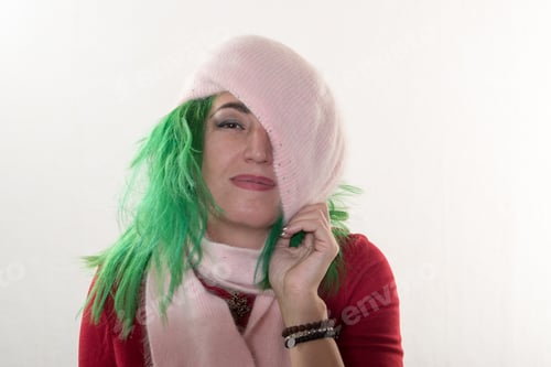 Preview: A Crazy Caucasian Girl Trying On Various Hats For The Christmas Fun Carnival. The Concept Of