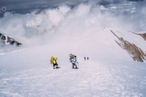 Preview: Group Of People Climbing In High Mountains