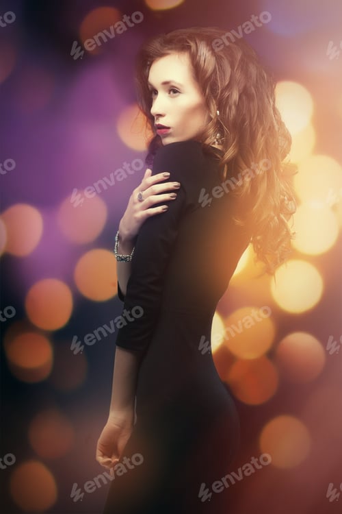 Preview: Beautiful Young Woman With Long Hair And Jewelery.