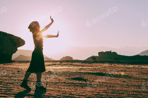 Preview: Beautiful Young Woman In Timna, Desert In Israel. Rocks In Sunset Time. Mystic Concept