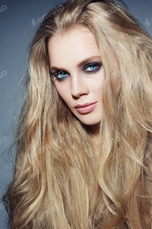 Preview: Young Beautiful Woman With Long Blond Hair And Stylish Smoky Eyes Make-Up