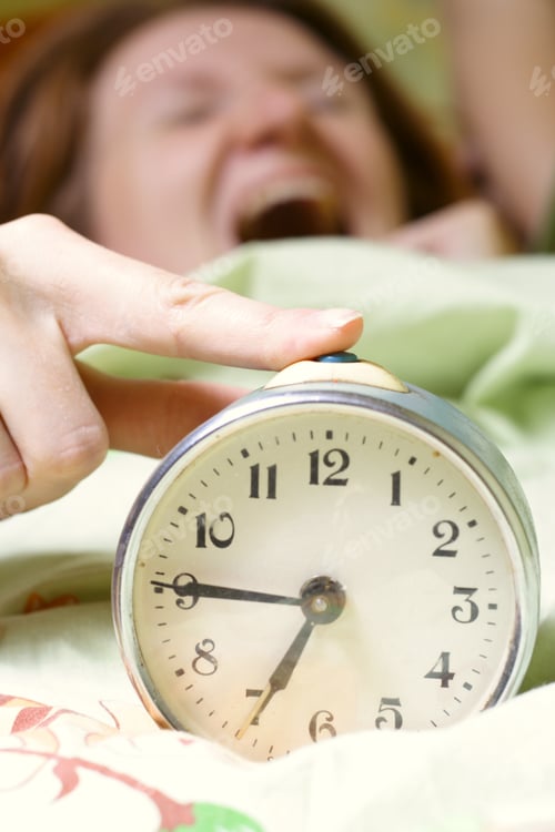 Preview: Alarm Clock Disturbing A Sleeping Woman That Is Defocused