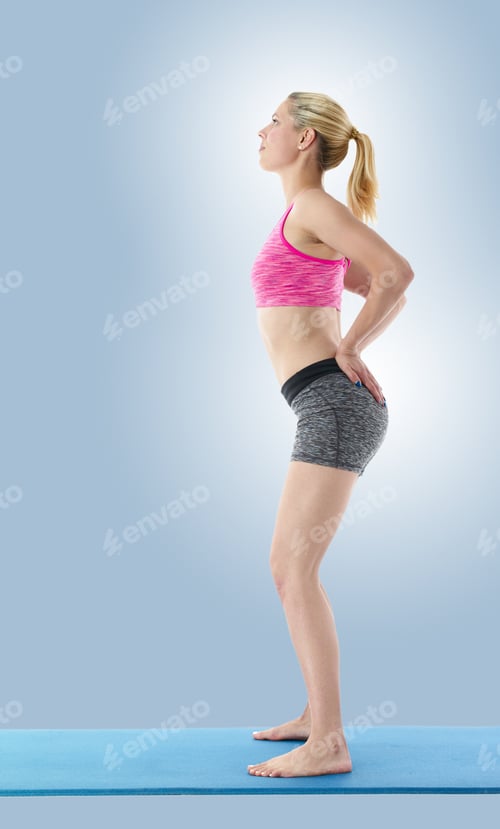 Preview: A Pretty Young Slim Woman Exercising With Yoga