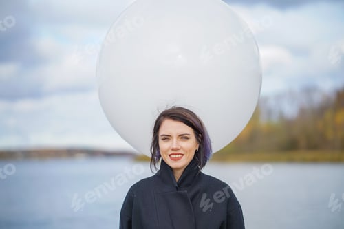 Preview: Portrait Of A Beautiful Girl With A Balloon In Autumn
