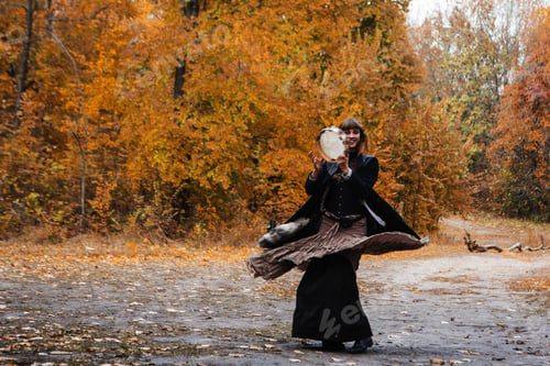 Preview: Autumn Portrait Of Dancing Woman With A Tambourine