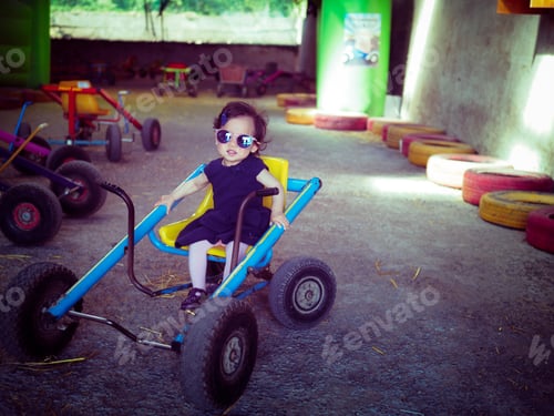 Preview: Baby Girl Playing Toy Car In Farm